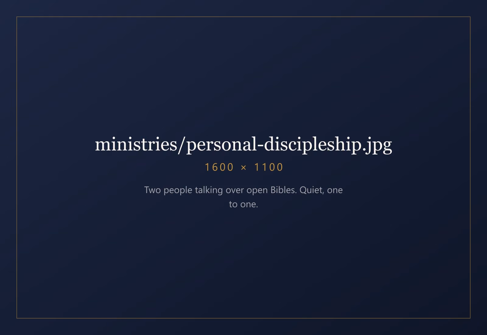 Two people sitting together with open Bibles, talking quietly.